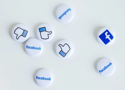 Buttons with Facebook Likes and Facebook Logo on