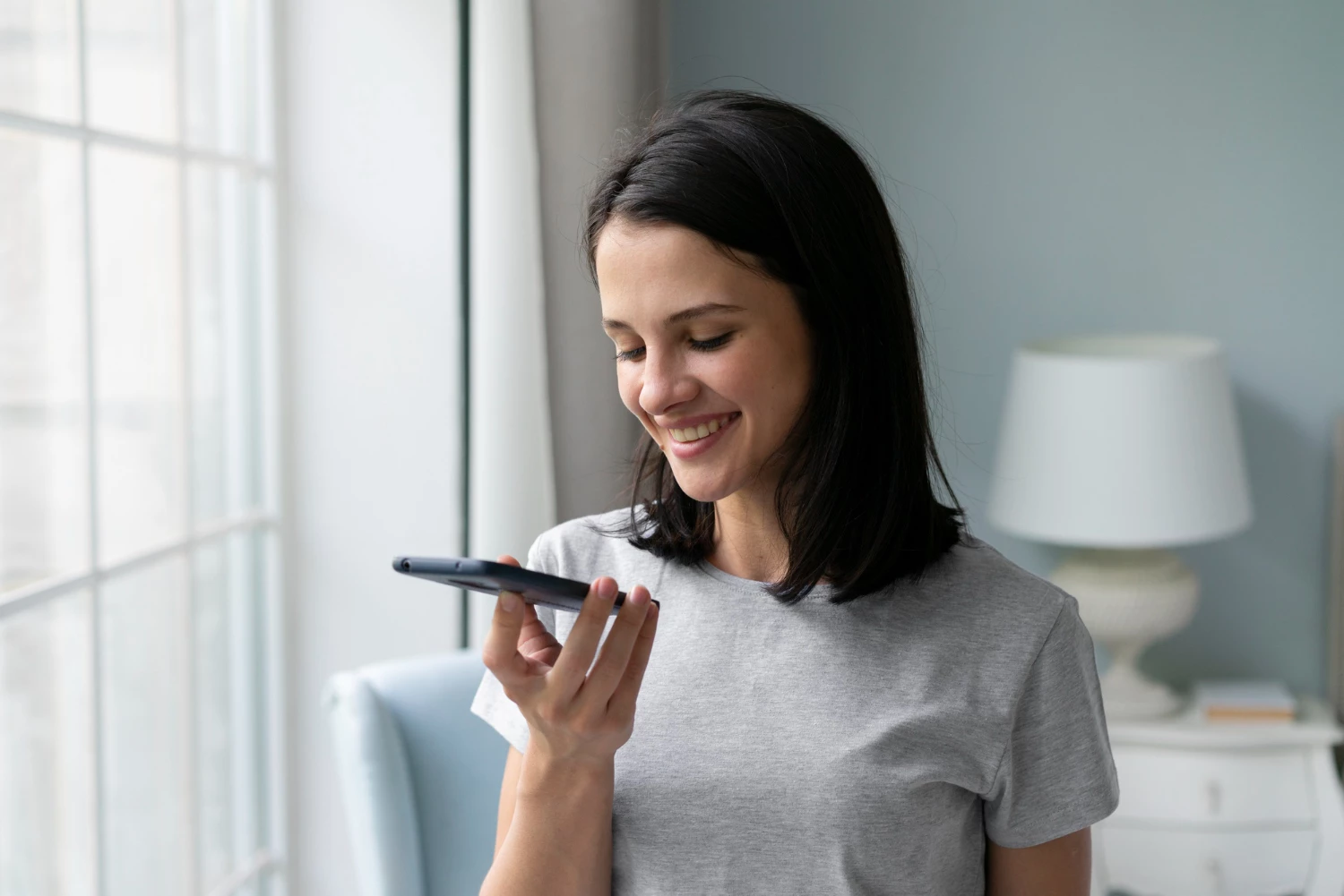 Using Voice search to receive spoken responses through a mobile device