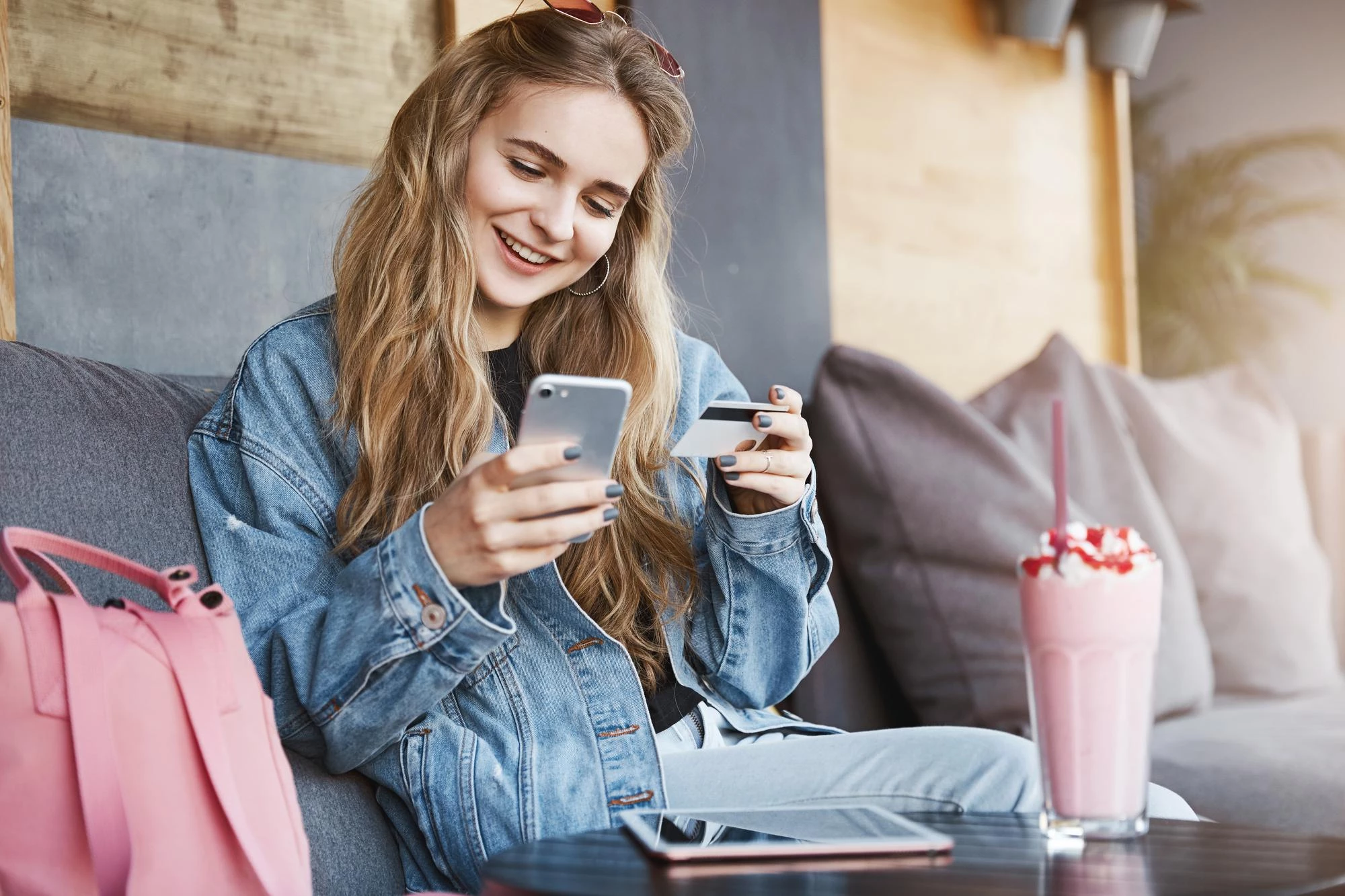 woman online shopping on her mobile phone